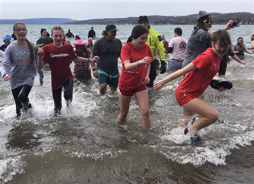 Canandaigua polar plungers brave frigid lake for charity