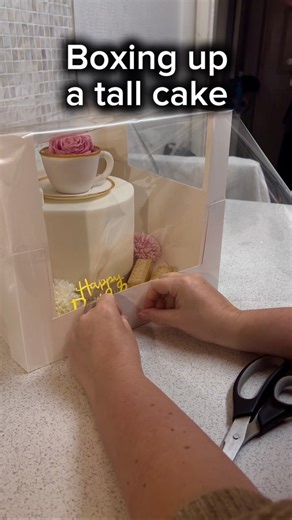Boxing up a tall cake .. .. . #cakedecoratingvideos #cakedecoratingtutorial #cakedecoratingtips #cakeart #cakedecoratingclass #cakebox #cakeboxes #tallcake #tallcakebox #cakeboxing #cakeboxextenders #cakedecoratingtips #cakedecoratinghacks #bakinghacks #baking #bakingtips #bakingtipsandtricks #bakingtime #BakingInspiration | Rosie's Cakes