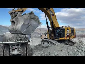 Huge Caterpillar 6015B Excavator Loading Caterpillar Dumpers - Sotiriadis Mining Works