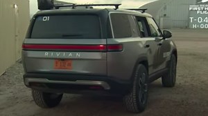 Jeff Bezos rolls up to Blue Origin launch in SUV from Tesla competitor