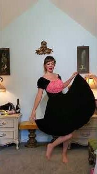 Dainty Rascal dancing in vintage black & pink lace dress