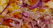 pizza using a large number of different ingredients close-up,...