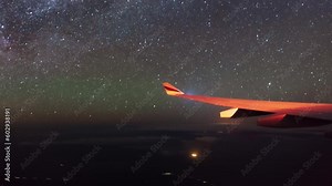 Milky Way timelapse from the airplane window, taken over Africa. Night from the airplane window. Airbus A330.