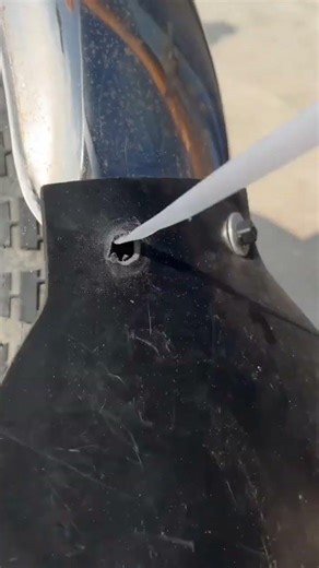 Install an additional fender on the back of the motorbike to keep clothes safe from puddles #shorts