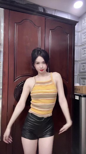 Dance Moves in Colorful Striped Tank Top