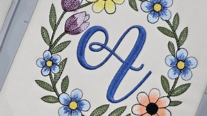 New Amazing Monogram Club monogram and frame! Included is the frame with the letters A-Z (BX format also included!) https://ohmycrafty.com/products/floral-frame-monogram-am #monogram #machineembroidery #embroiderydesign #embroiderymonograms | Oh My Crafty Supplies