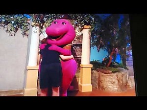 great big hug with Barney at universal studios in Orlando