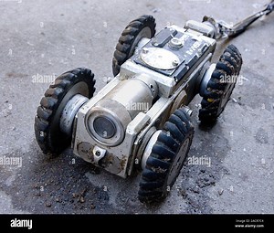 Remote-controlled video camera assembly designed for sewer or environmental inspection of small-diameter (about 150mm minimum) pipes and similar. It c Stock Photo - Alamy