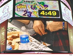 Mick Foley Just Got Disqualified From the Wing Bowl for Stuffing His Fanny Pack