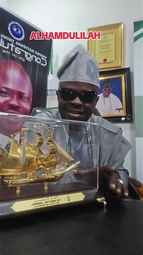 Golden Model Ship Display in Formal Office Setting