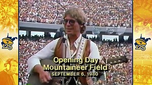 Today in #WVU125 history – September 6,1980: John Denver performed Country Roads at the opening of new Mountaineer Field. West Virginia won the contest 41-27 over Cincinnati. | WVU Football