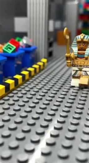 Egyptian Warrior and a Lego ruby (trans-red stud)