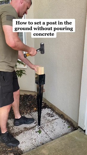 How to set a post in the ground without pouring concrete our retractable hose reel #diy #gardenproject #hosereel #retractable #jenwoodhouse #diyproject #gardenproject #gardentok #gardeningtips #gardeninghacks