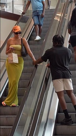 Touching random strangers on escalators PRANK!