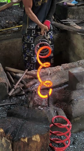 technique for straightening coil springs quickly‼️ #medievalblacksmith #fypviralシ #viralshort #usa