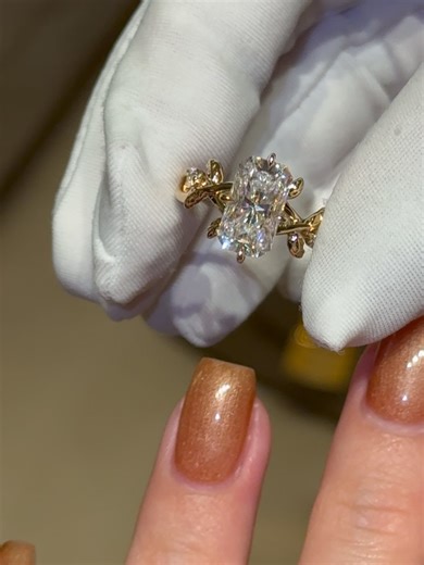 EARTHENA on Instagram: "The Flora Set 🌼☀️ The Flora engagement ring paired with the Flora diamond band — a love story in full bloom. Rings Featured 🤍The Flora, 3ct Elongated Radiant-Cut Moissanite Compass Hidden Halo Floral Ring ✨ Available with your choice of lab-grown or natural diamond center stone, custom-crafted in 14K or 18K gold, or platinum 🤍The Flora, V-Shaped Floral Diamond Band floral engagement ring // radiant cut moissanite ring // hidden halo engagement ring