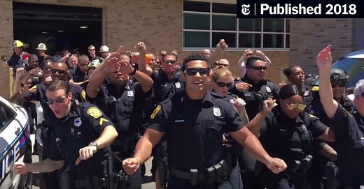 Police Officers Lip-Sync as Part of Public Relations Dance