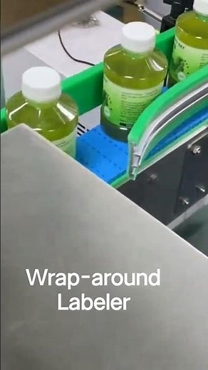 Wrap-around Labeler / Wrap-around Labeling Machine.