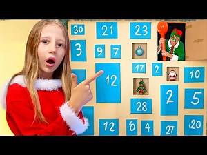 Nastya works her way through Christmas layers to reach the bouncing toys.