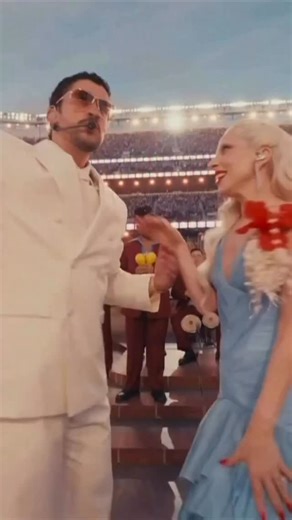 Over The Moon on Instagram: "Did you see the first-ever Super Bowl wedding? 💍 Yesterday, @badbunnypr invited a Puerto Rican couple to sweetly exchange vows on the field during his halftime performance. 🇵🇷🏈🎶 And the bride wore @misshayleypaige’s “Becoming Jane” dress from the designer’s Twice Upon a Time Collection. 💗 Talk about a fairytale moment. 🎥: @applemusic #badbunny #superbowl #halftimeshow #ladygaga #wedding"