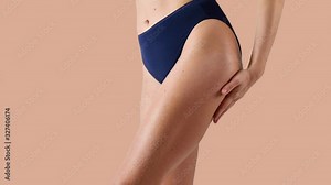 Skin care. Woman applying body lotion on her leg Stock Video