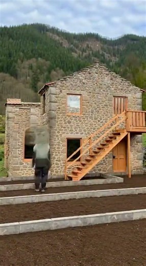 Rustic Mountain Stone Cottage with Vibrant Terraced Garden