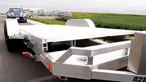 The Aluma 8216 Power Tilt Trailer. https://alumaklm.com/products/tilt-trailers/ https://alumaklm.com/dealer-locator/ #aluminumtrailers #aluma #alumalife #carhauler #tilttrailer | Aluma Trailers