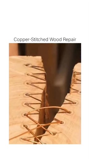 Whigga™ on Instagram: "This satisfying DIY tutorial demonstrates a sustainable way to repair cracked wooden slabs using copper wire and blue epoxy resin. The method involves drilling holes along the fissure and stitching it together with copper wire staples to stabilize the wood. This technique, inspired by the Japanese art of Kintsugi, prevents further splitting while adding a striking decorative finish once the epoxy is sanded smooth.The video has reached 252,000 views, highlighting the value 