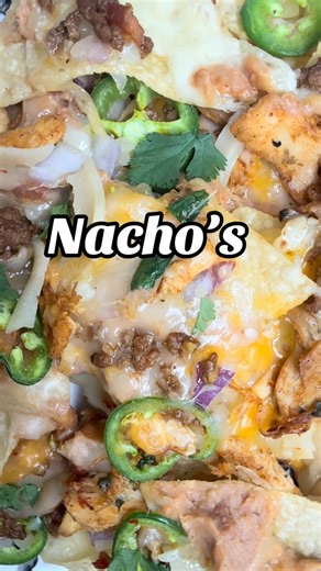 #Nachos spread tortilla chips on a baking sheet, layer with cheese and toppings, and bake until the cheese is melted. | The Punk Rock Chef