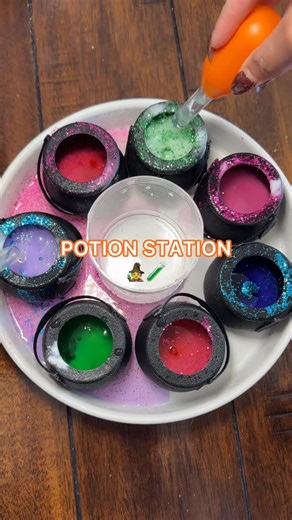 Learning Resources on Instagram: "They’ll LOVE this potion station 🧙‍♀️🧪✨ It’s super easy to set up and it’ll keep the kids entertained! Here’s what you’ll need: 🧪Mini Cauldrons 🧪A tray to catch the potion! 🧪Baking soda 🧪Vinegar 🧪Glitter 🧪Food coloring 🧪Jumbo Eyedroppers Tag us if you try it out! • • • #learningresources #learningthroughplay #halloween #potionmaking #halloweenfun #sensoryplayideas"