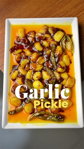NiloyDO on Instagram: "Garlic Pickle Recipe 🧄 Spicy homemade garlic pickle Traditional Indian garlic achar Easy garlic pickle recipe Tangy and flavorful garlic achar Best garlic pickle for rice & roti Instant garlic pickle at home Authentic Bengali roshuner achar Long-lasting garlic pickle recipe Homemade achar without preservatives Garlic lovers’ favorite pickle"