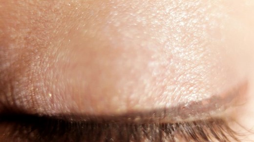 Green eye blinking - Free Stock Video