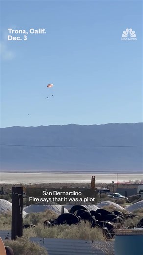 A pilot ejects as an F-16 fighter jet crashes in a California desert. | NBC News