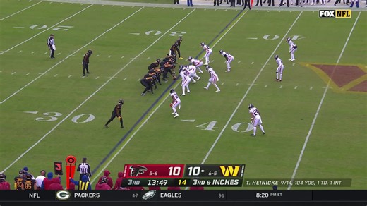 Brian Robinson follows solid blocking on 21-yard pitch