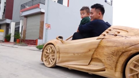 Test drive a homemade wooden Bugatti on the street with my son