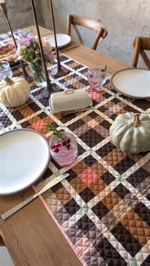 we had a little fun with styling my newly finished #petiteplaidquilt table runner. ✨🥰 have you ever made a table runner before? 🍽️ . Fun fact, if a quilt is block based, you can arrange them one by one or two by two and that will create a lonnnggggg rectangle for something like this. 👏 . That’s what I did for this quilt, it’s either a lap size quilt or a long table runner. 🤓 or a tree skirt like what I made last week! 🌲 . This quilt, along with fabric details are now on the blog and we also