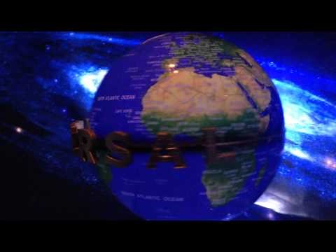Levitating Universal globe with logo and music.