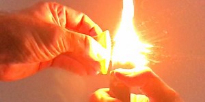 Why oranges spark when you hold a flame to them