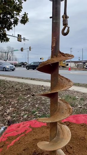 Construction Workers Managing Heavy Equipment Safely