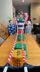 60K views · 911 reactions | The Ornament Drop Christmas Game  The whole family plays creative diy Christmas party game by rolling an ornament on pvc pipes and dropping it in a bucket for a prize. Whoever drops the ornament into the golden bucket, wins a special prize. This video was produced by Benson Family, Network Media, and Benson Bros. | Aaron’s Family | Facebook