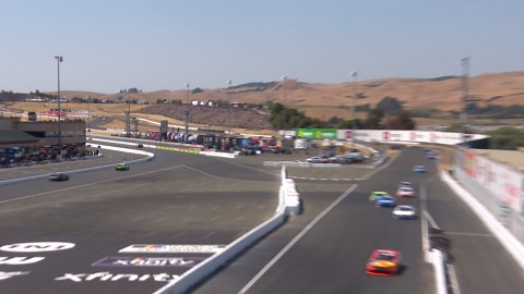 Harrison Burton gets nudged by Corey Day, spins around in Turn 11