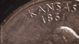 Kansas State Quarter Coin U.S. America elections Democracy Patriotism .USA State Name Money Economy Coin Macro Photography.Values of historical events and politics