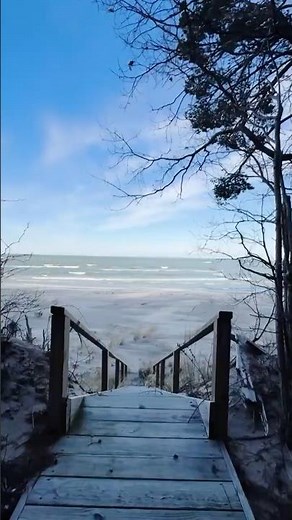 Step into this affordable Lake Michigan Cottage with Private Sandy Beach