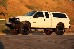 Lifting Our 2004 Ford F250 with Atlas Spring, Icon Suspension & LMC Truck