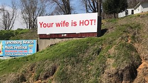 "Your wife is HOT," speculation over billboards' message heats up