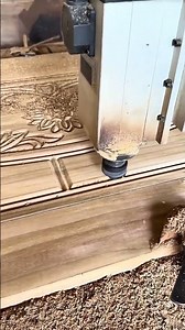 Precision Woodworking: CNC Machine Engraving Intricate Designs on a Wooden Panel