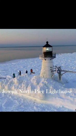 Polar Vortex Frozen Views of St. Joseph Lighthouse Sunset On Lake Michigan Full 4K: https://youtu.be/rMK8XfvPShM #nature #photography #drone #snow #puremichigan | Timeless Aerial Photography