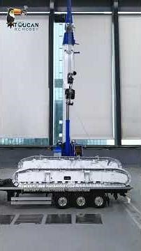 Custom blue‑and‑white 1/14 scale RC telescopic crawler crane D1200 by customer order