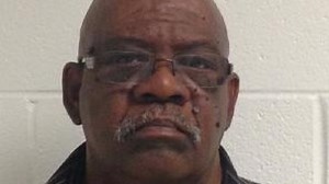 Driver handcuffed after unattended school bus with children on board crashes, striking a child