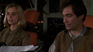 Bond (Timothy Dalton) and Kara Milovy (Maryam d’Abo) make their escape from the Hercules plane in THE LIVING DAYLIGHTS. The aircraft was lent to production by the Royal Moroccan Air Force. | James Bond 007